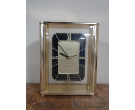 A Bulova quartz mantel clock. 