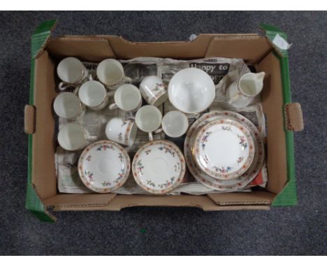 A tray containing a 37 piece English china tea service. 
