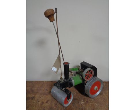 A Mamod live steam tractor. 
