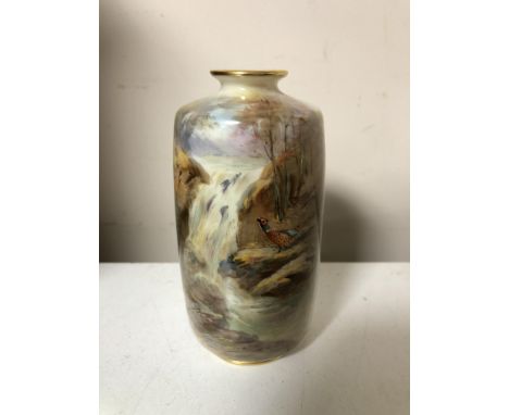 A Royal Worcester hand painted vase depicting pheasant by a waterfall, signed J. Stinton, shaped number 2597.  CONDITION REPO