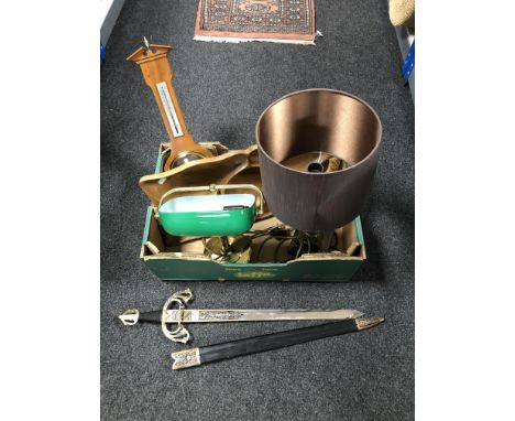 A box containing reproduction sword, barometer, table lamp with shade, banker's lamp, together with a twentieth century teak 