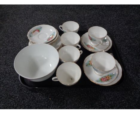 A 19 piece English bone china rose patterned tea service. 