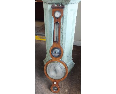 A 19TH CENTURY WHEEL BAROMETER, H 94 cm