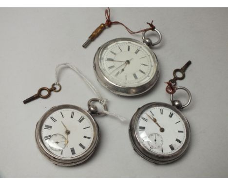 THREE HALLMARKED SILVER OPEN FACED MANUAL WIND POCKET WATCHES, largest Dia 6 cm