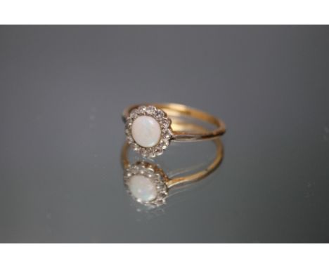 AN 18CT OPAL AND DIAMOND RING,  ring size Q 1/2