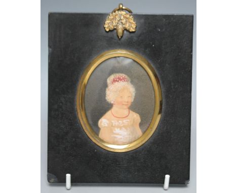 A PORTRAIT MINIATURE OF A GIRL, watercolour, framed and glazed, 7.5 x 6 cm