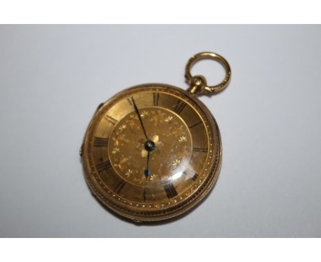 A HALLMARKED 18 CARAT GOLD OPEN FACED MANUAL WIND POCKET WATCH, being highly engraved throughout, Dia 4.25 cm 