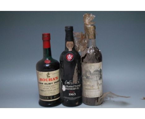 1 BOTTLE OF ROCHA'S 1964 RUBY PORT,  together with 1 bottle of Taylor's LBV reserve 1965 and 1 bottle of Chateau Pion 1972 Mo