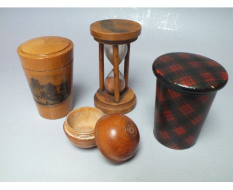 COLLECTORS LOT - A MAUCHLINE WARE GLASS HOLDER, together with a Mauchline ware egg timer and a Tartanware lidded pot etc. (4)