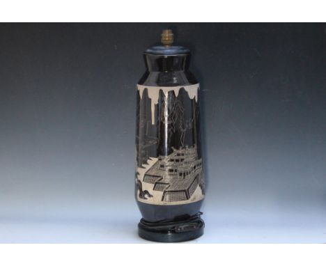 A TALL ORIENTAL STYLE LAMP,  decorated with a mountainous temple style scene, H 55 cm including wooden base