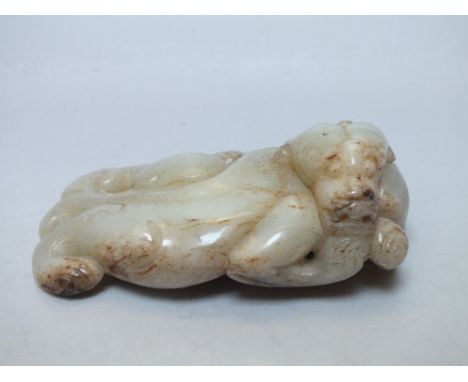 AN ORIENTAL JADE STUDY OF A MYTHICAL DRAGON, W 6 cm, L 10 cm
