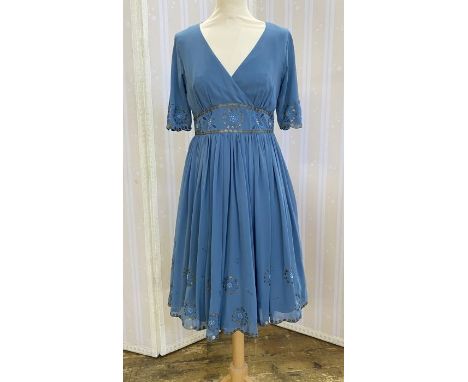 Blue chiffon embroidered vintage style dress&nbsp;with crossover bodice, sequin and embroidered detail to the waist and skirt