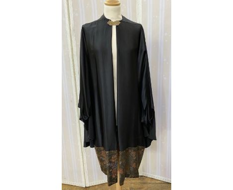 1920's black satin opera cloak&nbsp;with embroidered lame border (possibly continental), filigree brass-coloured metal buckle