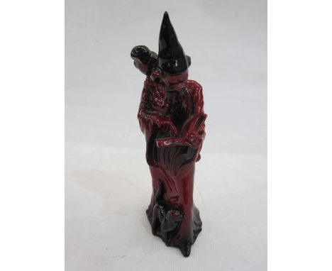 Royal Doulton flambe wizard, 25cm high Condition ReportSlight loss of shininess to the glaze at the bottom of the wizard's cl