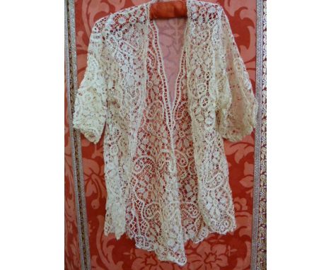 Edwardian machine bobbin lace jacket, and an Edwardian cotton skirt, embroidered, flounced, some stains, it has had the waist
