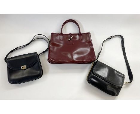 Vintage Gucci black shoulder bag, flap fastening with brass coloured Gucci logo clip, stamped 'Gucci' inside, wear to the str
