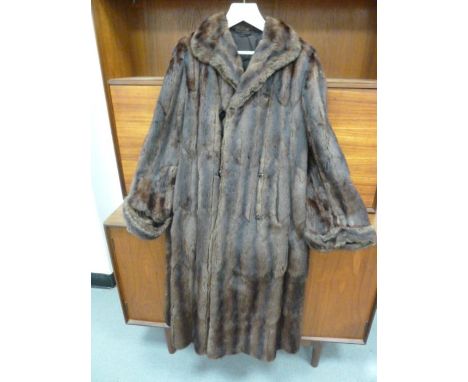 Vintage , (1920's ?) full length mink coat, the furrier name 'Bradleys' embroidered on the lining, the edges are worn, the cu