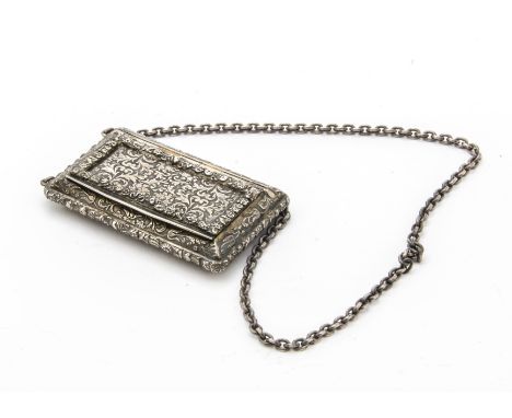 A fine first half 19th century continental silver snuff box, having raised and chased scrolling floral designs, later applied