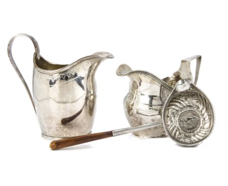 Two George III period silver helmet shaped milk jugs, one marked Birmingham 1799 by George Ashworth, together with a toddy la