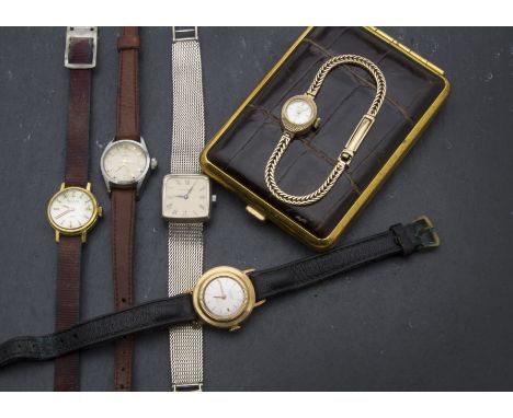 A group of five ladies wristwatches, including a 9ct gold Majex example with box and instructions, 11g, a silver Garrard watc