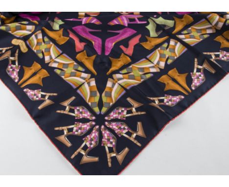 A silk scarf from Salvatore Ferragamo, blue ground with designs of shoes, with box (2) 