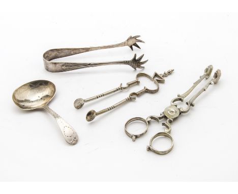 A George III period silver brightcut design tea caddy spoon by RJ, together with a pair of similar period silver sugar scisso