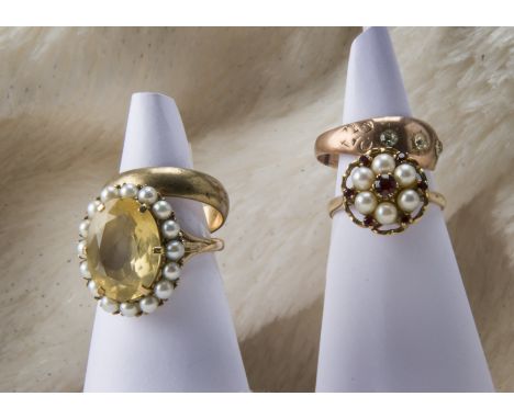 A group of four Victorian and 20th century 9ct gold rings, including a citrine and pearl cluster, a pearl and garnet cluster,