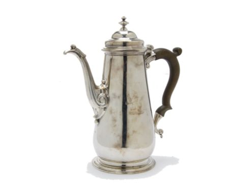 A good George II silver hot water pot by John Wirgman, tapered body bearing rampant lion family crest with scroll and shell s