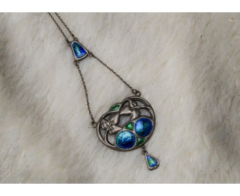 An Art Nouveau silver and enamelled necklace by Charles Horner, the pierced panel with green and blue enamel with pendant, on