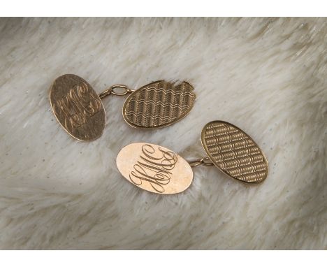 A pair of 9ct gold cufflinks, oval panels, one with engraved initials, the engine turned, 4.5g (2) 