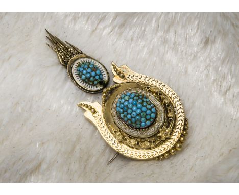 A Victorian mourning brooch, the archaeological revival piece with white enamel and turquoise beads, having drop also with tu