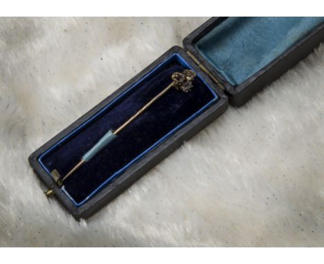 A Victorian diamond stick pin, in case, with two fancy coloured and a clear old (2) 