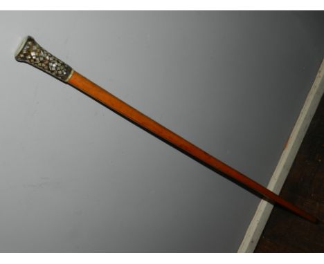 A late 19th century horn mounted walking cane, inlaid with mother-of-pearl and central portrait. H: 91cm 