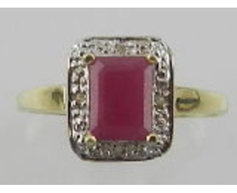 A yellow metal, ruby and diamond set ring, the shank stamped 375. 