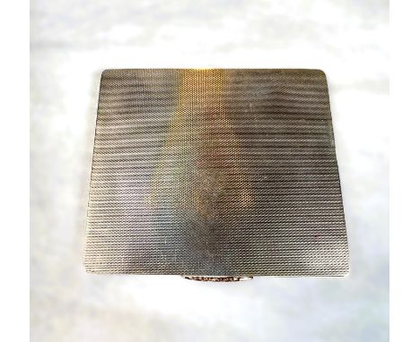 A hallmarked silver cigarette case with engine turned gilt interior, Birmingham, 1966, 4.3oz.