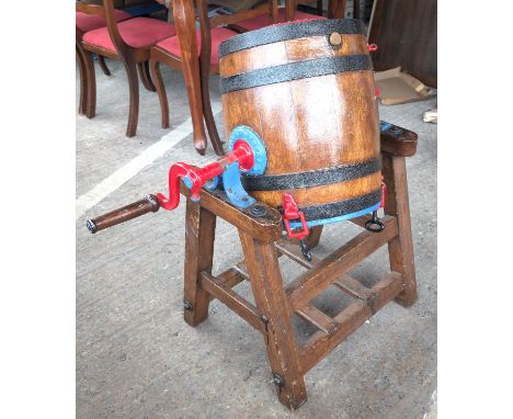 A Llewellin Haverfordwest barrel butter churn with painted metalwork.