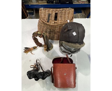 A selection of collectables including a WWII period flying helmet and goggles; a bugle; a pair of binoculars and a fisherman'