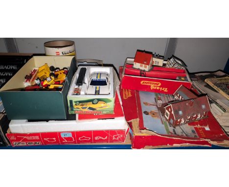 A 'Polestar' Scalextric style racing car game; vintage remote controlled cars etc; a 1960's boxed Triang 00 gauge train set (