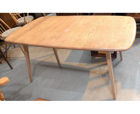 An Ercol Windsor 'Grand Plank' elm and beech extending dining table with fold out leaf, 150x90cm. Extending to 225cm