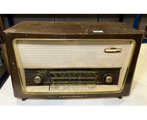 A vintage Aiwa record sound system AF-5090 and a vintage walnut radio.