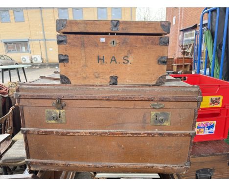 A 19th century cabin trunk and pine tuck box.