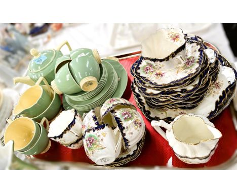 An Art Deco Minton Solano ware 22 piece tea set inc. teapot, pale green and cream; a vintage bone china tea set decorated wit