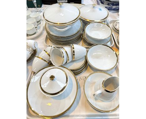 A Bohemian "Brigitta" 36-piece gilt and white part dinner and tea service.