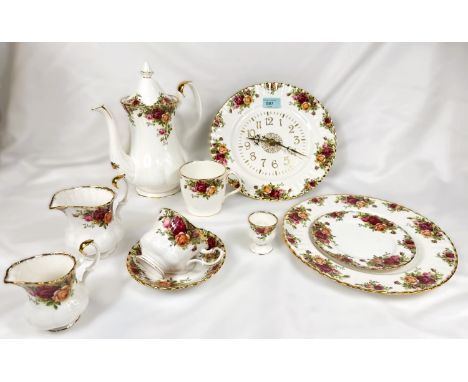 A Royal Albert Old Country Roses part dinner and tea service with coffee pot and clock etc., approx. 43 pieces.