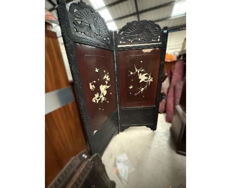 A vintage bi-fold Japanese room screen with carved birds to the top and panels with mother-of-pearl and bone Shibayama design