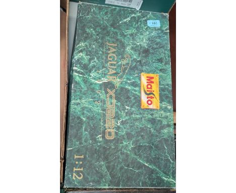 A 1:12 Maisto Jaguar XJ220, boxed diecast cars, Eddie Stobart and other cars.