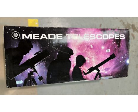 A boxed Meade telescope 114/900 EQ1-B model.
