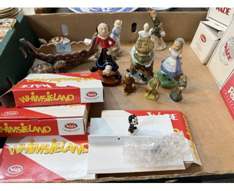 Four boxed groups of Wade figures; 7 originally boxed Wade figures, "Peter Pan", "Toad of Toad Hall" etc; a Wade long boat an