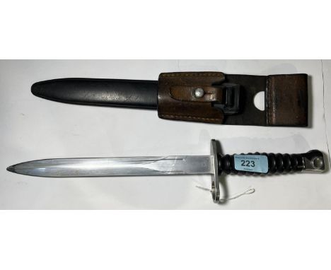 A Swiss STGW M1957 Bayonet with scabbard and frog, stamped on blade.