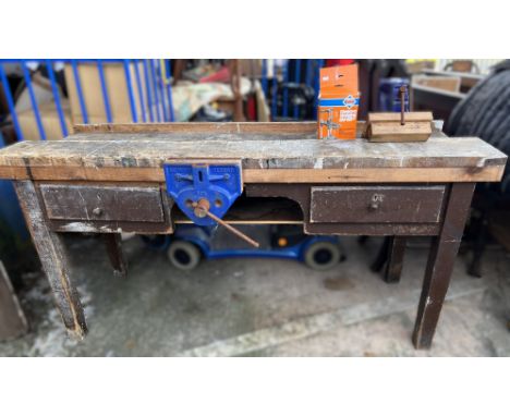 A heavy workbench and a selection of tools.
